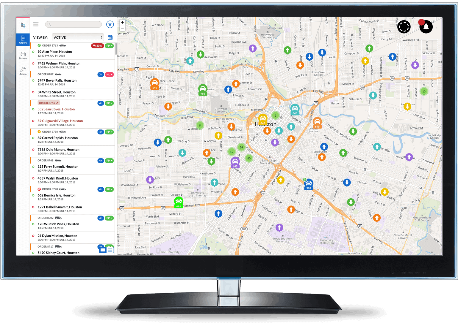 A computer monitor displaying a detailed map with various location markers and a list of locations on the left sidebar.